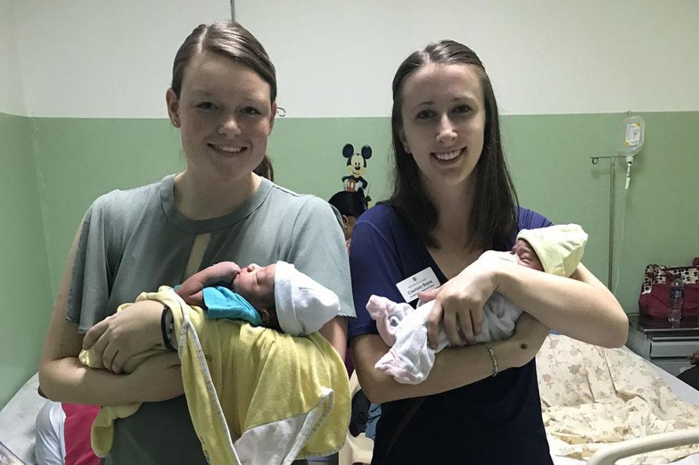 Two Keuka College students stand next to each other in the Dominican Republic