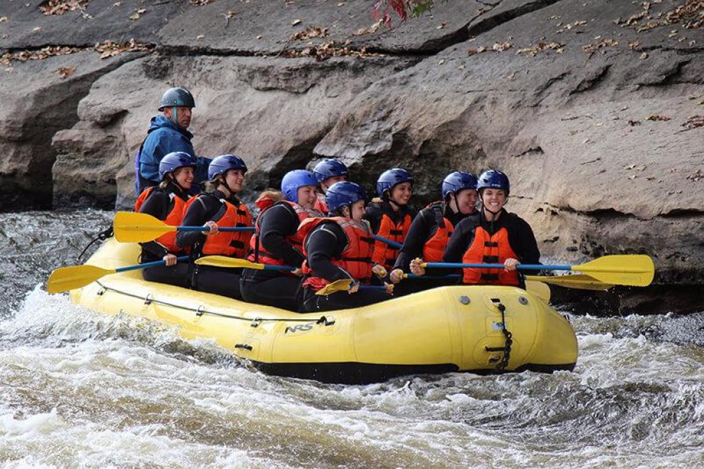 Students whitewater rafting